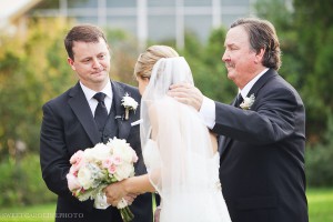 Father of bride giving daughter away